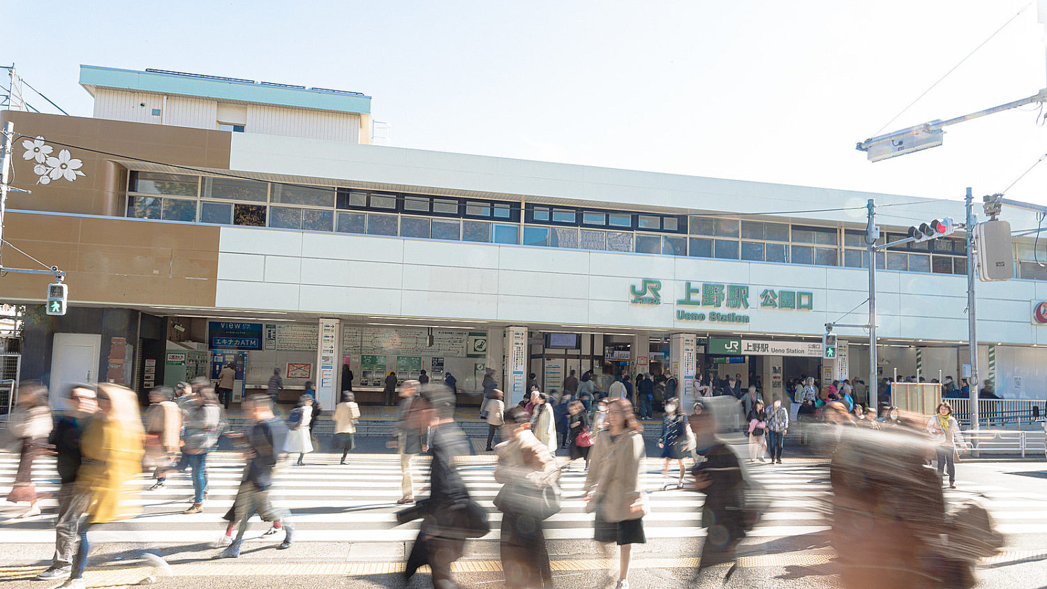 Crowded street in front of JR Ueno station.